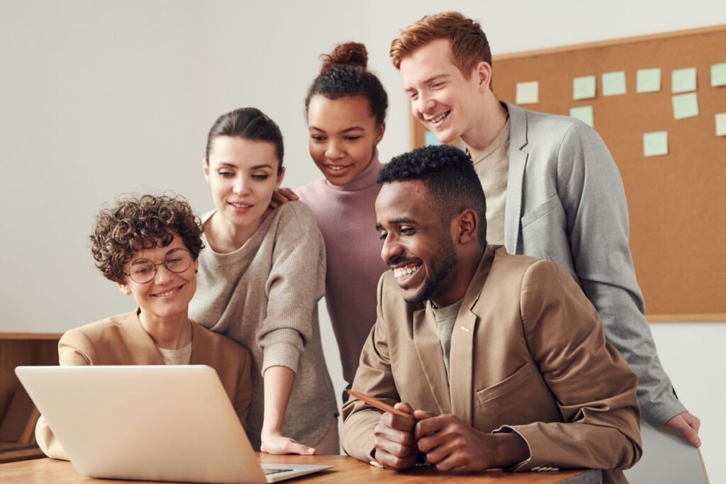 Small business team collaborating with AI tools