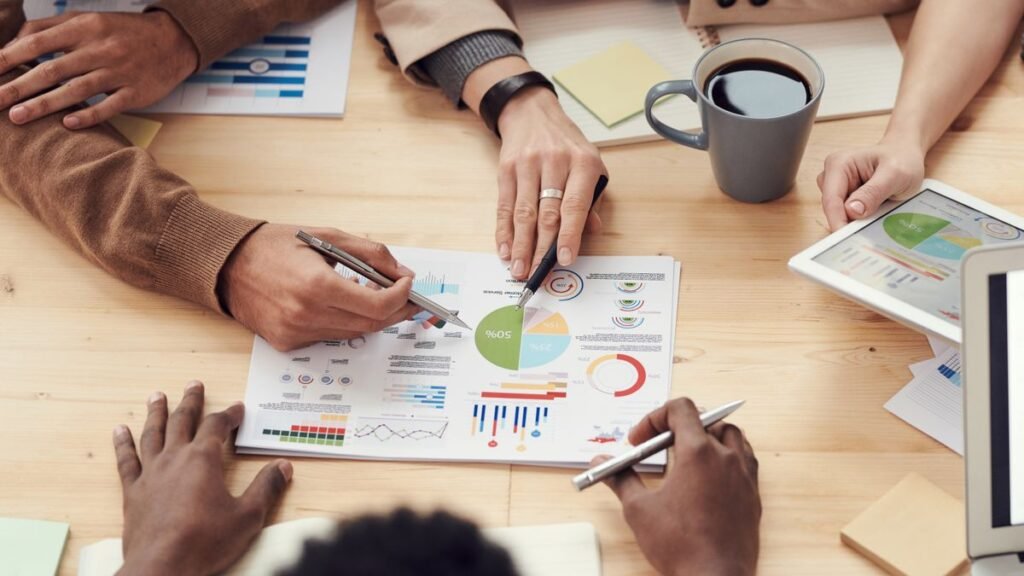 Marketing team reviewing analytics charts